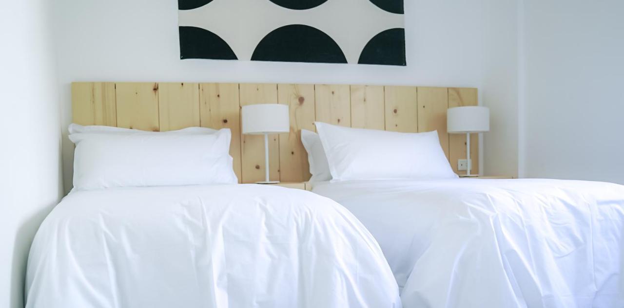 Casagrande Hotel & Beach Club José Ignacio Exterior foto A bed with white sheets
