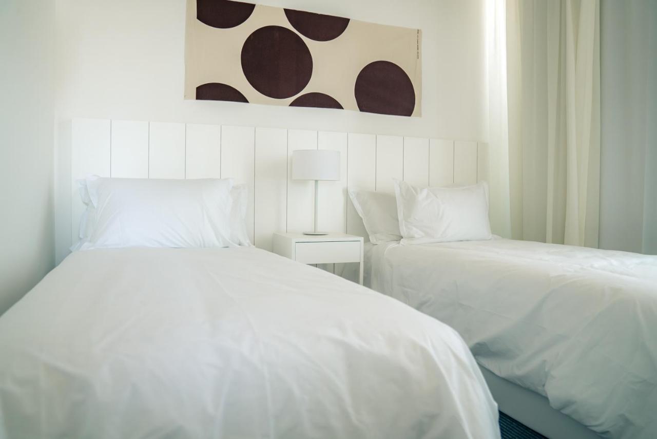 Casagrande Hotel & Beach Club José Ignacio Exterior foto A bedroom with two single beds